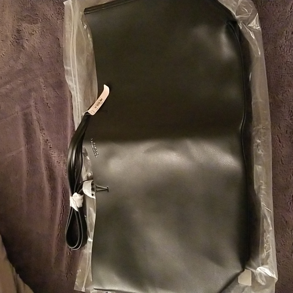 NWT, Victoria's Secret black overnight bag with bonus sequined make up bag